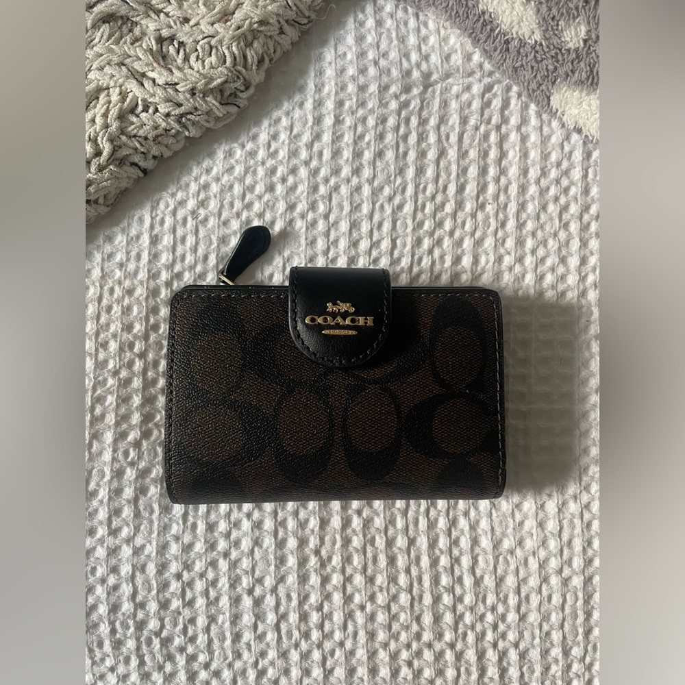 Brown logo coach wallet